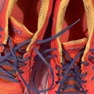 Red yellow and blue ASICS